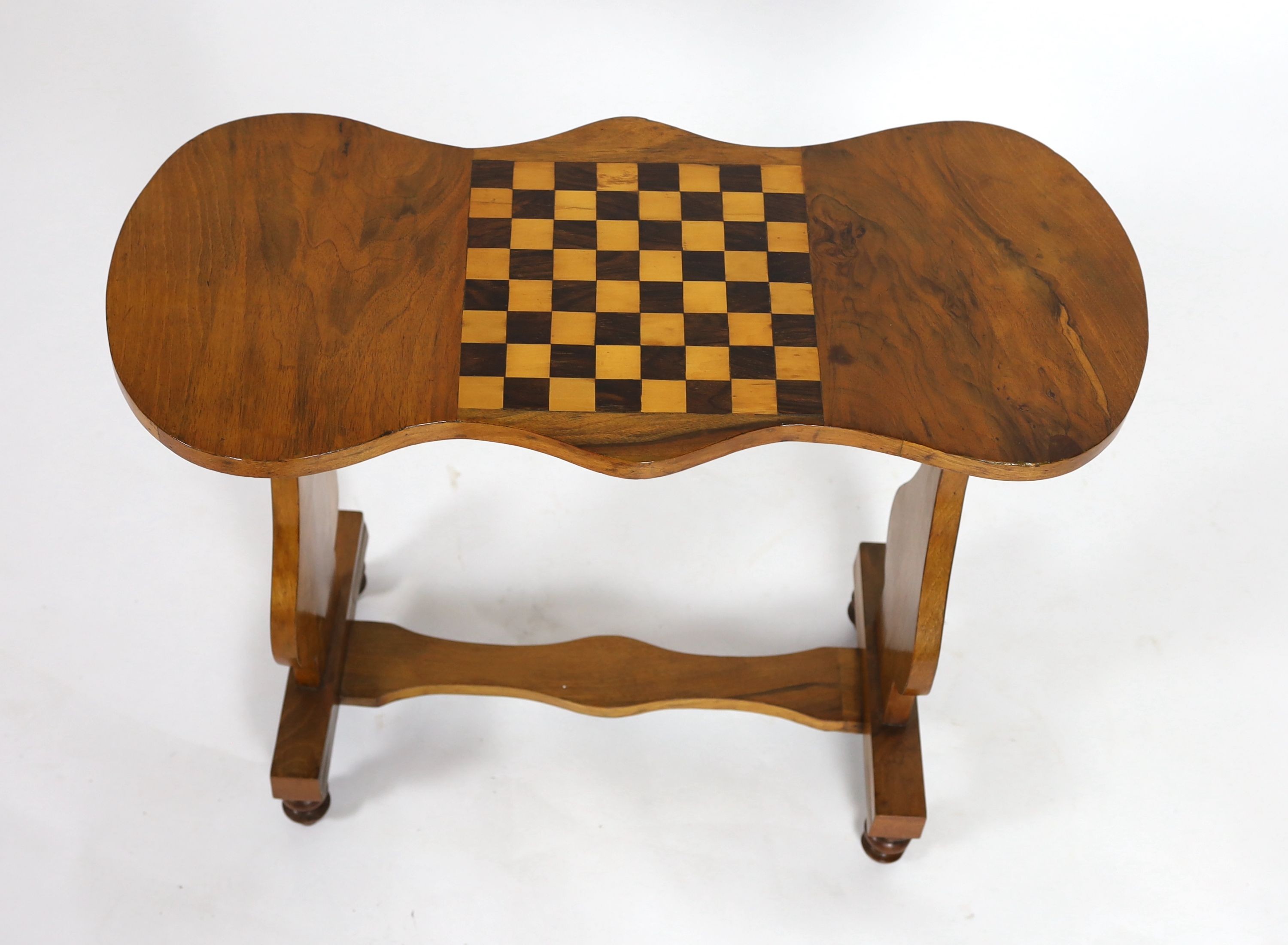 A Victorian parquetry inlaid walnut games table, of rectangular serpentine form, width 84cm depth 39cm height 70cm